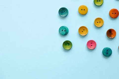 Colorful button on blue background Stock Photos