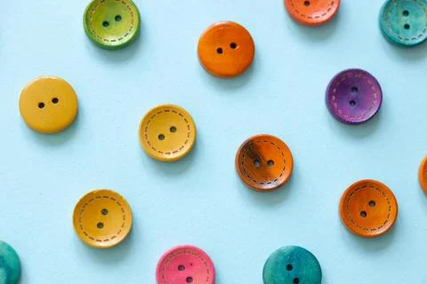 Colorful button on blue background Stock Photos