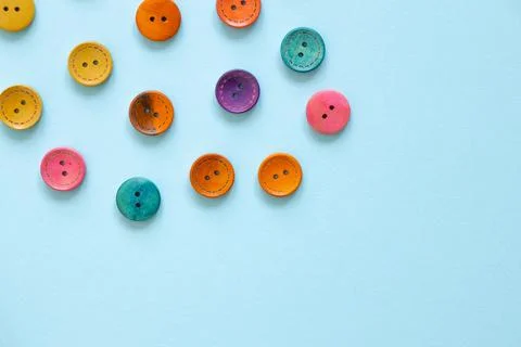 Colorful button on blue background 库存照片