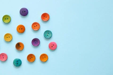 Colorful button on blue background Foto stock