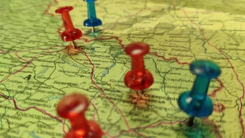 Colorful button nails on map of Ukraine. Strategy plan close up Stock Footage 227673183