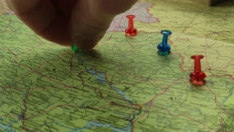 Colorful button nails on map of Ukraine. Strategy plan close up Stock Footage 227683163