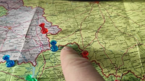 Colorful button nails on map of Ukraine. Strategy plan close up Stock Footage 228288122