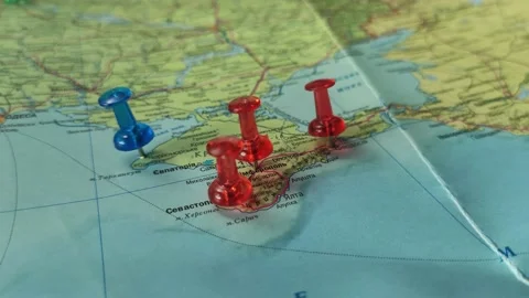 Colorful button nails on map of Ukraine. Strategy plan close up Stock Footage 228289190