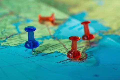 Colorful button nails on map of Ukraine. Strategy plan close up 写真素材
