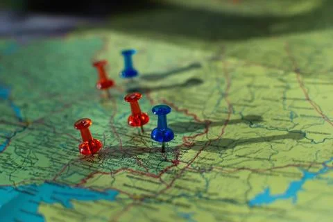 Colorful button nails on map of Ukraine. Strategy plan close up Stock Photos