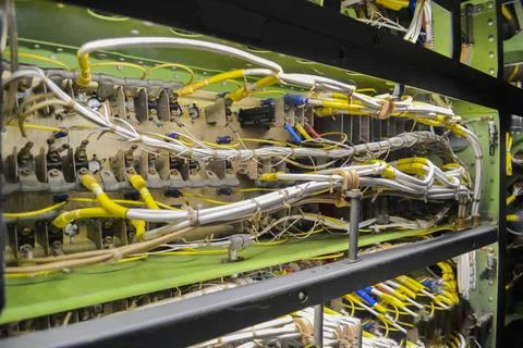 Colorful cables connected to server at data center. Colored cables intertwined w Foto stock