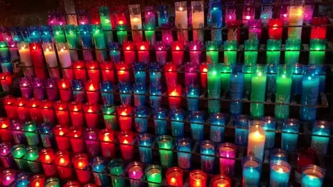 Colorful candles in a temple Stock Footage 243169365