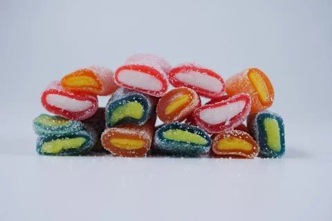 Colorful candy displayed on a plain white background Stock Photos