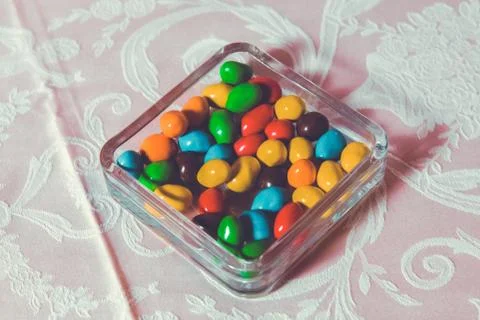 Colorful candy . Multi colored sweets . Colored candy in a glass . Round Stock Photos