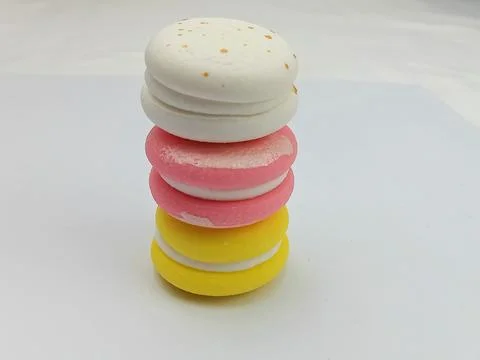 Colorful candy stack on white background Stock Photos