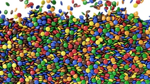 Colorful candy's falling down from above Vídeo Stock 76589741