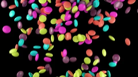 Colorful candy's motion falling down from above and filling the screen. Sweets Video stock 104825964