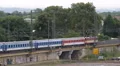 Colorful Cars Wagons International Intercity Train Departure Movement Passing HD Footage