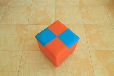 Colorful chair in the shape of a cube. Stock Photos