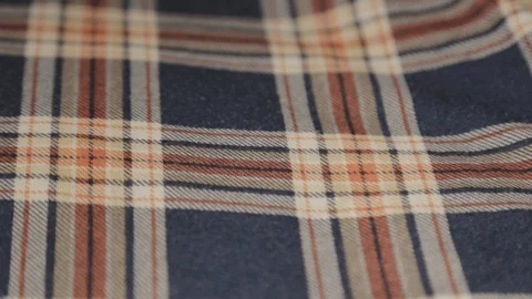 A colorful checkered pattern in a beautiful and comfy fabric. - Close-up Stock Footage 128358402