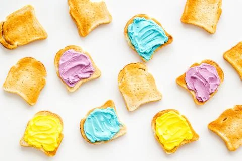 Colorful cheese spread on bread pattern, top view Stock Photos