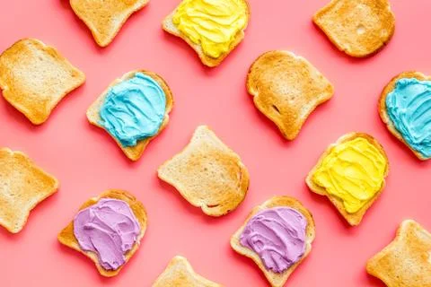 Colorful cheese spread on bread pattern, top view Stock Photos