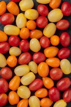 Colorful cherry tomatoes pattern top view Stock Photos