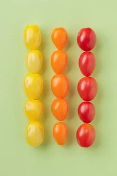 Colorful cherry tomatoes pattern top view Stock Photos