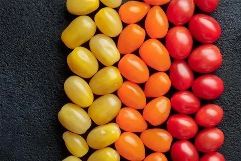 Colorful cherry tomatoes pattern top view Foto stock