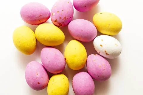 Colorful chocolate Easter eggs background with copy space 스톡 사진