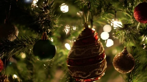 Colorful Christmas ball decoration on Christmas tree with bokeh lights Stock Footage