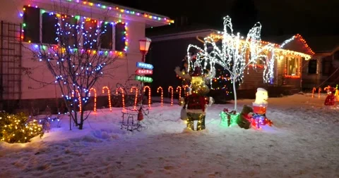 Colorful Christmas lights and decorations on house in winter 库存影片 141613053