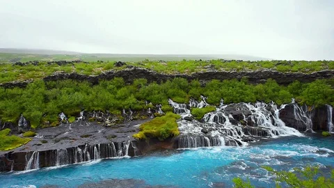 Colorful cinemagraph loop of waterfall Hraunfossar Lava Falls in Iceland Stock Footage 130073431
