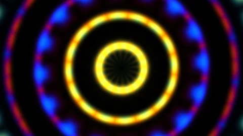 Colorful circles create a dynamic light pattern in dark Stock Footage 337961480