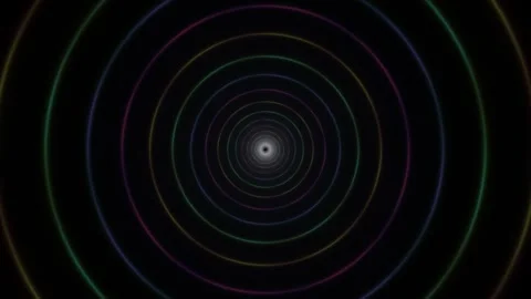 Colorful circles create a spiral pattern with a dark Stock Footage 338010489