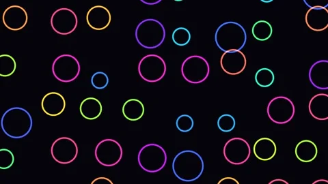 Colorful circles dance in a seamless looping background Stock Footage 340565582