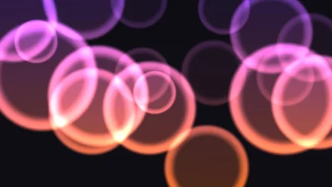 Colorful circles move in a dark space with light effects Stock Footage 338187586
