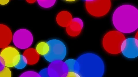 Colorful circles slowly falling down on a dark background Stock-Footage 70955225