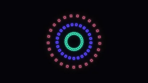 Colorful circular lights create patterns in dark background Stock Footage 338300889