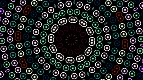 Colorful circular pattern with dots and shapes in a dark Stock Footage 338286017