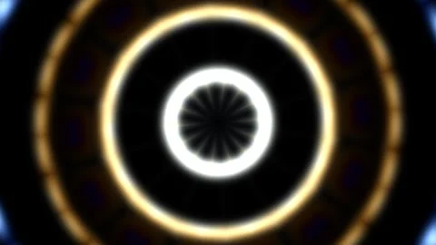 Colorful circular patterns create a motion effect in dark Stock Footage 338007705