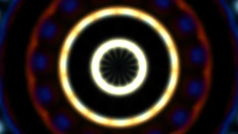 Colorful circular patterns form and change in a dark Stock Footage 338013209