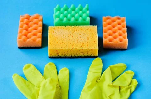 Colorful cleaning set for different surfaces in kitchen, bathroom and other r Stock Photos
