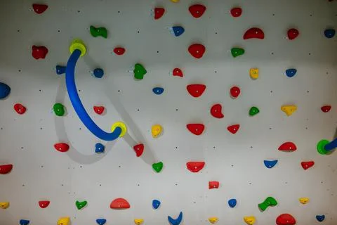 Colorful climbing wall for small children in different patterns Stock Photos