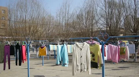 Colorful Clothes Drying In The Sun Stock Footage 10922951
