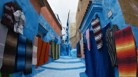 Colorful Clothes Inside The Streets Of Chefchaouen, Morocco Stock Footage 314864523