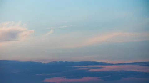 Colorful clouds in motion. Timelapse beautiful clouds in sky in evening sunlight Stock Footage 134943359