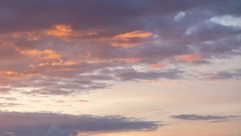 Colorful clouds moving in time-lapse. Beautiful clouds in sky evening sunlight Stock Footage 136200406
