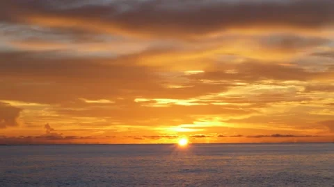 Colorful clouds on the sea in the evening 스톡 동영상 142244480