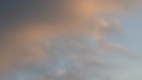 Colorful clouds from the setting sun. 库存影片 148877268