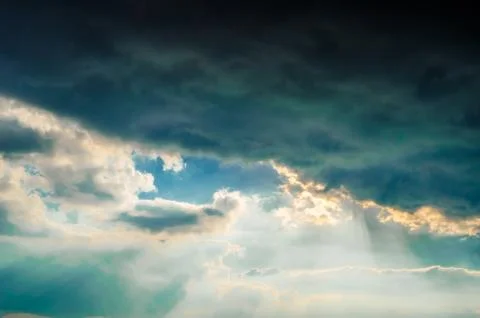 Colorful clouds at sunset Stock Photos