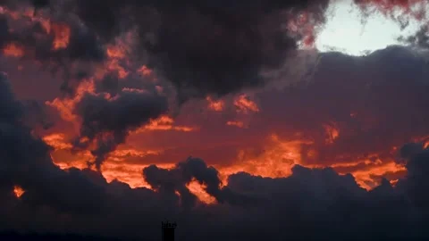 Colorful clouds at sunset. Red, orange and grey clouds on the sky. Stock Footage 321413414