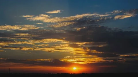 Colorful clouds at sunset time lapse Stock Footage 126237383