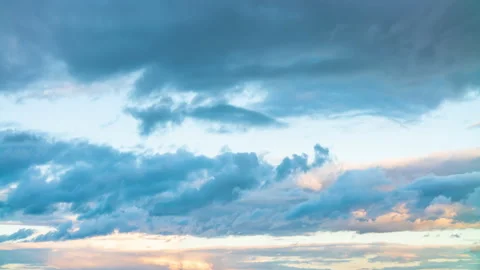 Colorful clouds in time-lapse. Timelapse beautiful sky in evening sunlight Stock Footage 136309771